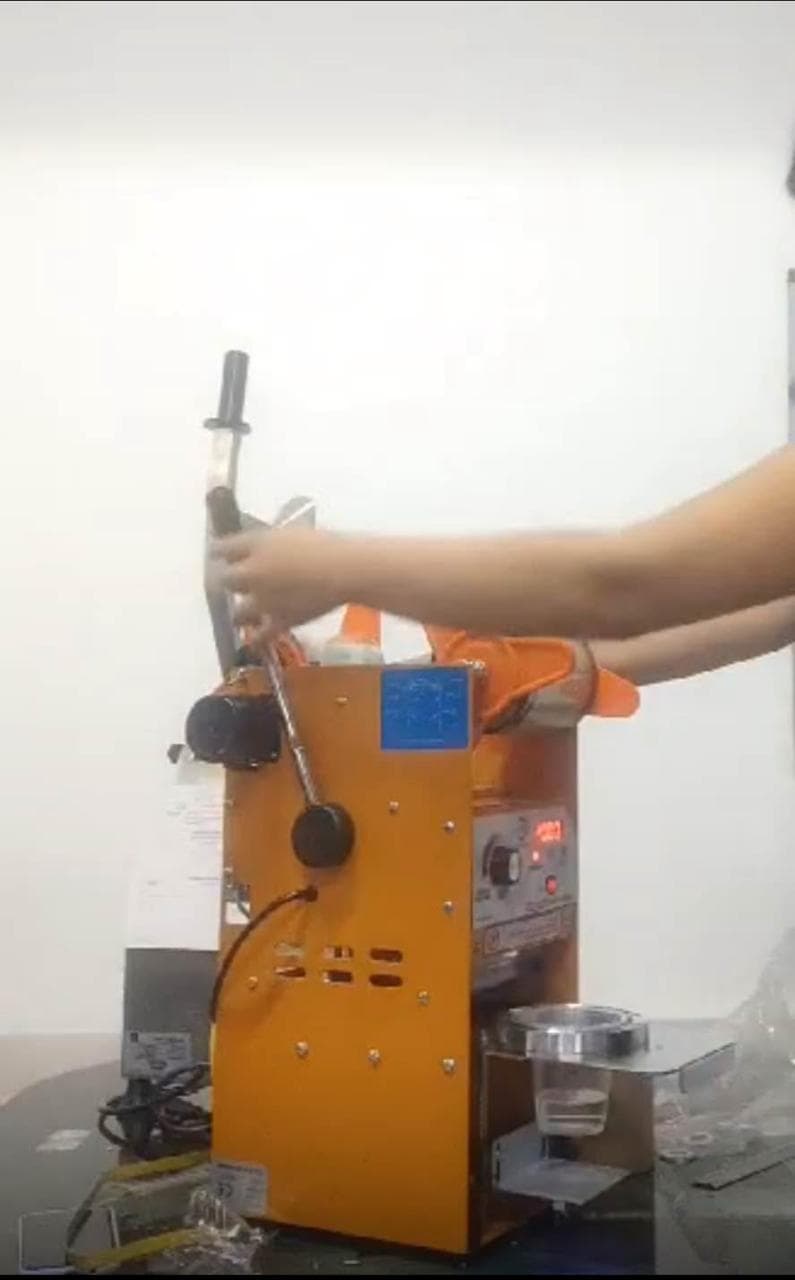 Máquina selladora de vasos semiautomática para negocios Copiar